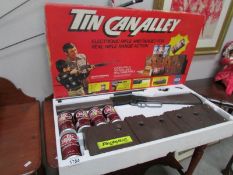 A boxed 1970's Chuck Connors tin pan alley electronic rifle range,