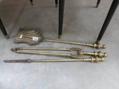 A set of 3 brass fire irons