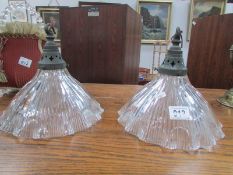 A pair of vintage ceiling lights