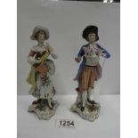 A pair of Italian porcelain figures with original labels (Galleria Rotti, Via De La Vite 44,