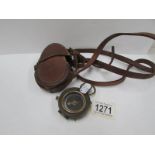 A first world war compass in case, marked No.69768 1917 and hand marked E.L.