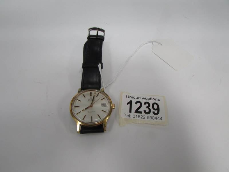 An Omega automatic wrist watch with dedication on reverse