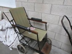 A vintage Alwin wheel chair