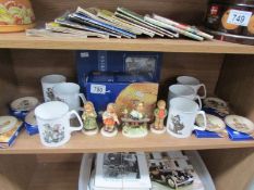 4 boxed Hummel figures 6 plaques together with 6 unboxed mugs