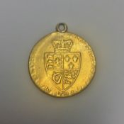 A George III gold spade guinea (poor)