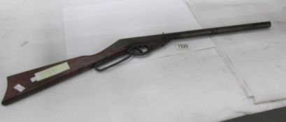 A pre-war tin plate child's air rifle