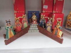 A Royal Doulton Bunnikins stand with Henry VIII and his 6 wives Bunnikins