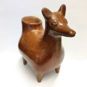 An unusual Chinese pot in the shape of a cow (approximately 18cm high and 17cm long)