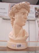 A bust of a Young man