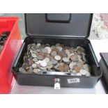 A locking cash box with various GB coinage