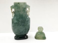 An Chinese apple green with emerald green inclusions jadeite miniature vase and cover with ring