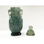 An Chinese apple green with emerald green inclusions jadeite miniature vase and cover with ring