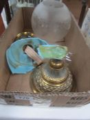 A Victorian oil lamp with brass base and complete with etched shade,