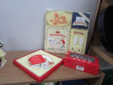 A Royal Doulton bunnikins gift set,