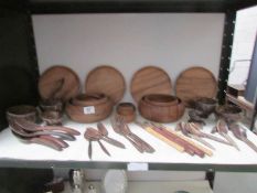 A mixed lot of wooden bowls, platters,