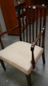 An Edwardian mahogany arm chair