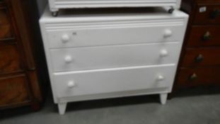 A painted 3 drawer chest