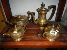 A 4 piece brass tea set