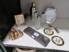 A mixed lot including Dutch plaques, hip flask, cocktail shaker, brass knocker, cruets,