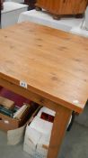 A square pine table