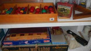 2 shelves of old toys and games etc