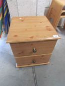 A pine 2 drawer bedside chest