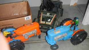 2 1960's battery operated tractors and a remote controlled jeep