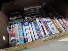 A box of assorted videos