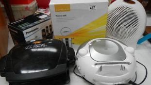A radio/CD player, a Lakeland pasta pot, A George Foreman grill,