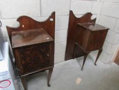 A pair of old mahogany bedside cabinets