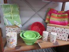 A shelf of new kitchen items