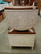 A Lloyd loom linen bin and one other