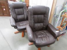A pair of swivel chairs