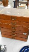 A set of vintage filing drawers