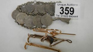A silver Columbian coin bracelet, horse head crown,