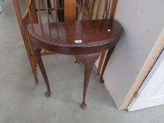 A D shaped hall table