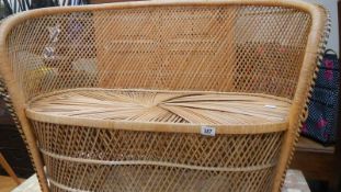 A wicker settee