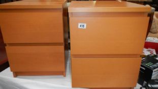 A pair of modern bedside chests