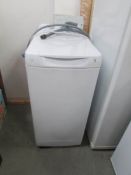 A Hotpoint top loading washing machine