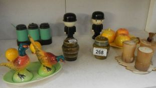 A mixed lot of collectable salt & pepper pots including Royal Worcester and Carlton ware