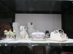 A mixed lot of china including Staffordshire spaniels, cheese dishes etc,