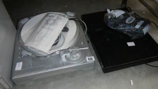 A turntable and a DVD player