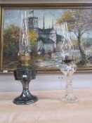 An Aladdin oil lamp and a glass oil lamp