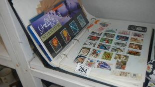 A quantity of loose stamps and an album