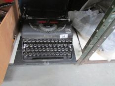 A cased Imperial portable typewriter