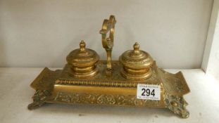 An Edwardian brass 2 compartment ink stand