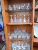 4 shelves of drinking glasses