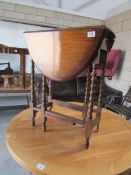 A small oak gate leg table