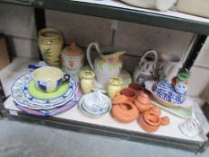 A mixed lot of ceramics including plates, vases,