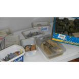 A collection of WW2 military miniatures including Horses,